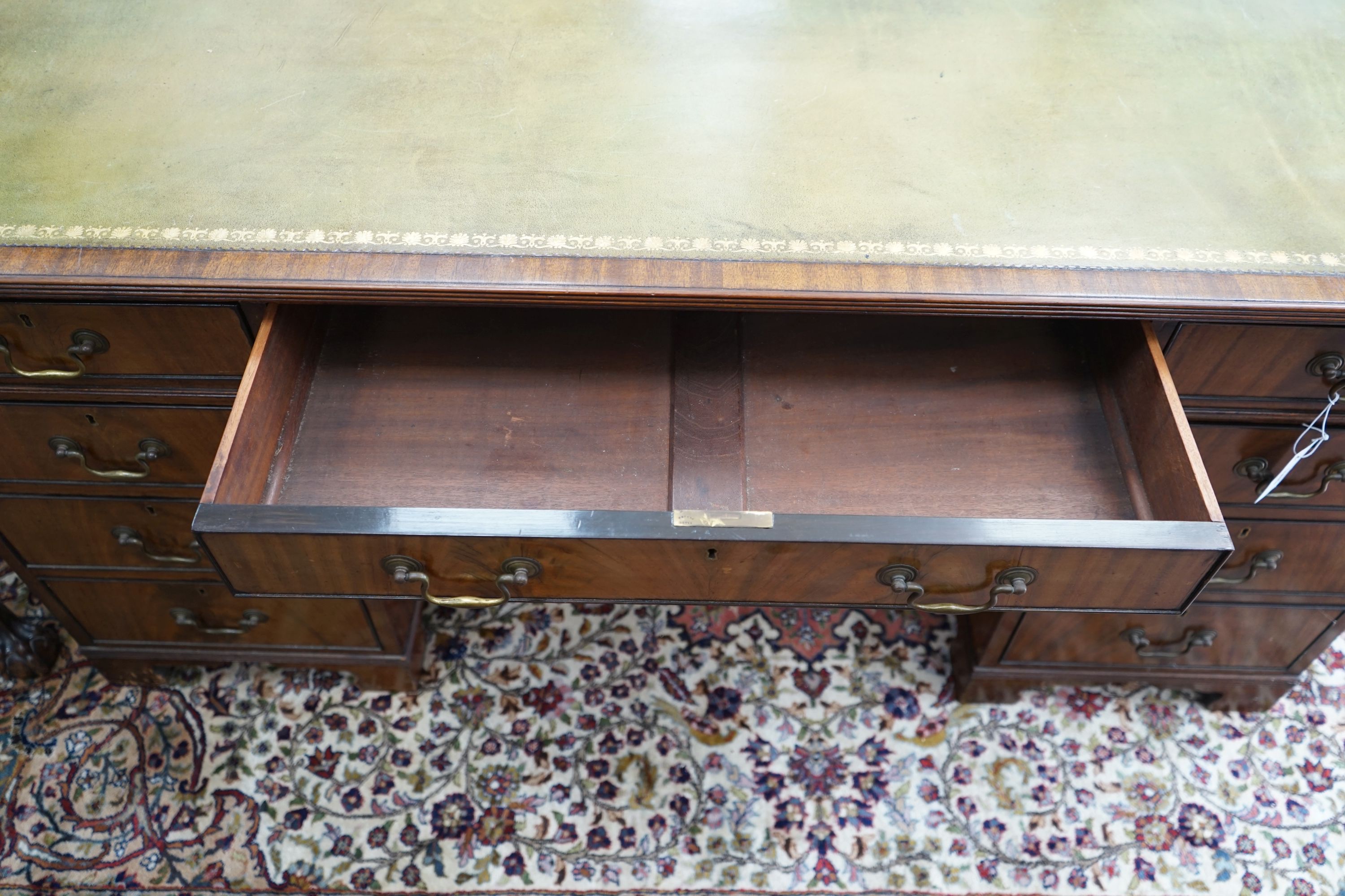 An early 20th century George III style mahogany pedestal desk, width 154cm depth 84cm height 74cm